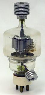 Picture of an Eimac VT-129/304TL tube showing the Eimac-manufactured grid and plate heat sinks attached.